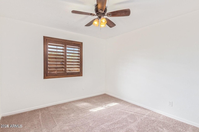 1316 N Spring Cir, Mesa, AZ 85203 - empty room featuring carpet flooring, baseboards, and a ceiling fan