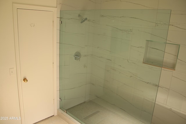 full bath featuring a shower stall