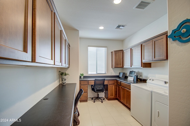 kitchen with built in desk and washer and dryer