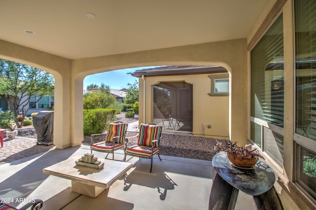 view of patio featuring a grill