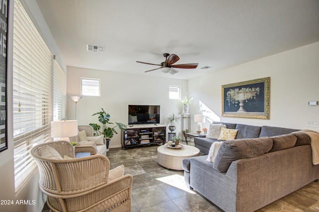 living room featuring ceiling fan