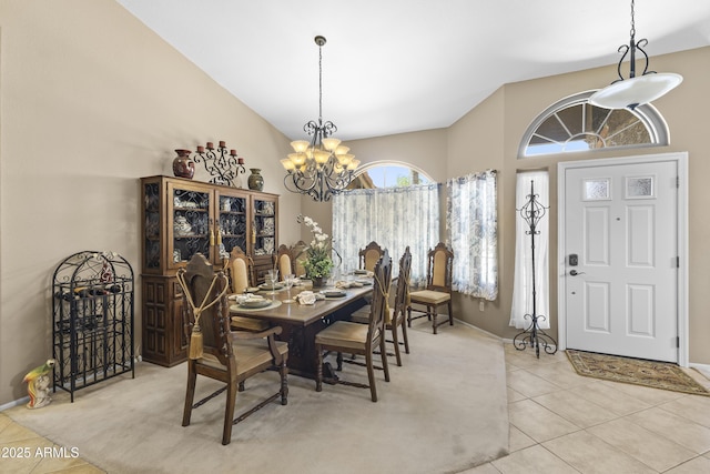 1449 W Sherri Dr, Gilbert, AZ 85233 - dining area featuring a chandelier, tile patterned flooring, and vaulted ceiling