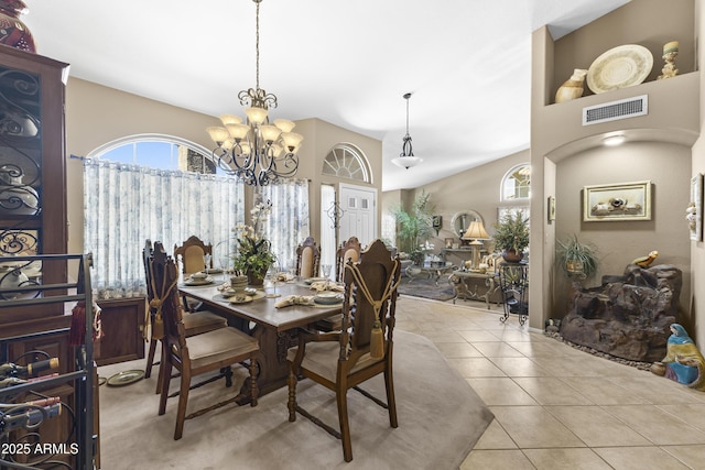 1449 W Sherri Dr, Gilbert, AZ 85233 - dining space with a chandelier and light tile patterned floors
