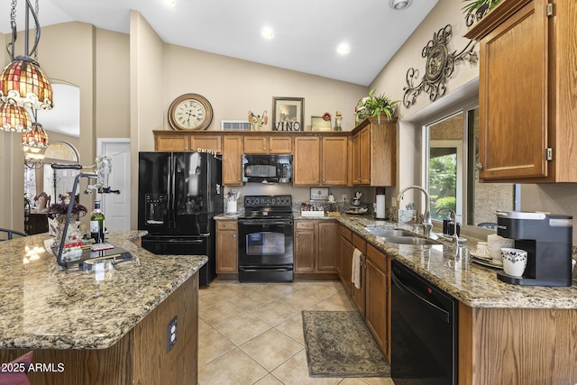 1449 W Sherri Dr, Gilbert, AZ 85233 - kitchen with black appliances, brown cabinetry, light tile patterned flooring, light stone counters, and high vaulted ceiling