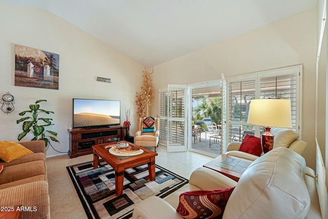 living area with vaulted ceiling