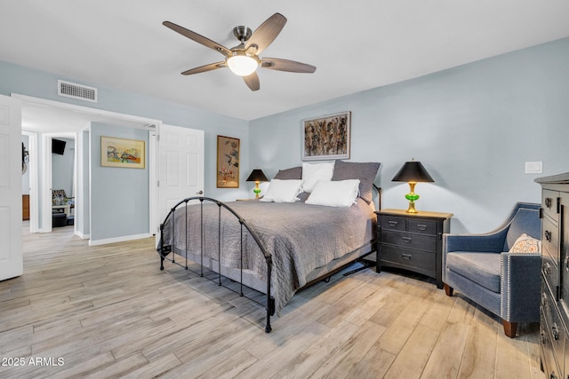4116 E Downing St, Mesa, AZ 85205 - bedroom with light wood-style floors and a ceiling fan