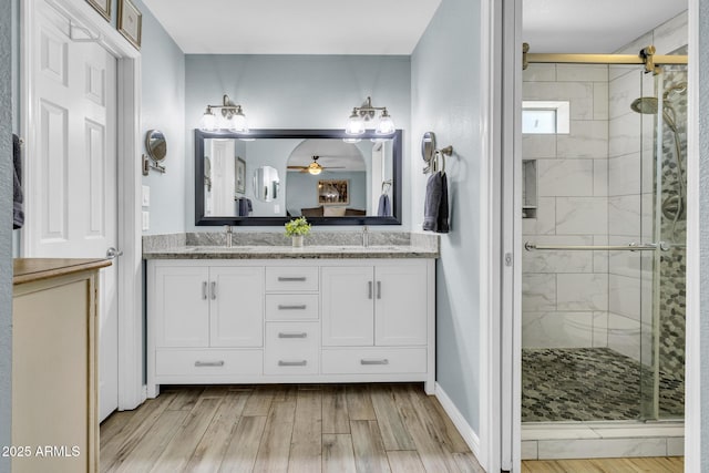 4116 E Downing St, Mesa, AZ 85205 - full bath with a stall shower, double vanity, wood finished floors, and ceiling fan