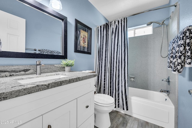 4116 E Downing St, Mesa, AZ 85205 - bathroom with vanity, shower / tub combo with curtain, and wood finished floors