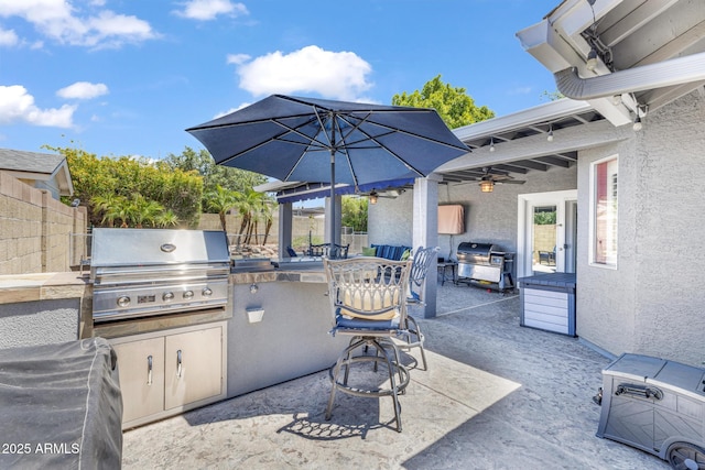 4116 E Downing St, Mesa, AZ 85205 - view of patio / terrace with exterior kitchen and ceiling fan
