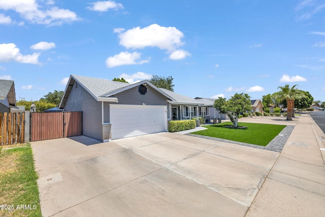 4116 E Downing St, Mesa, AZ 85205 - single story home featuring a gate, a garage, and concrete driveway