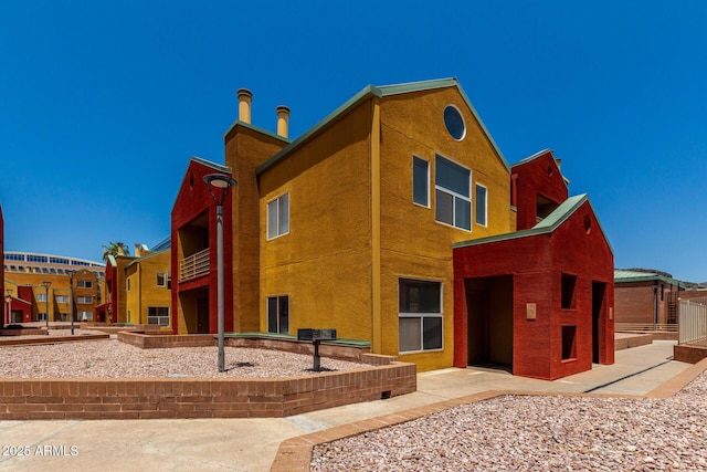154 W 5th St Unit 210, Tempe, AZ 85281 - view of front of property with stucco siding and a patio