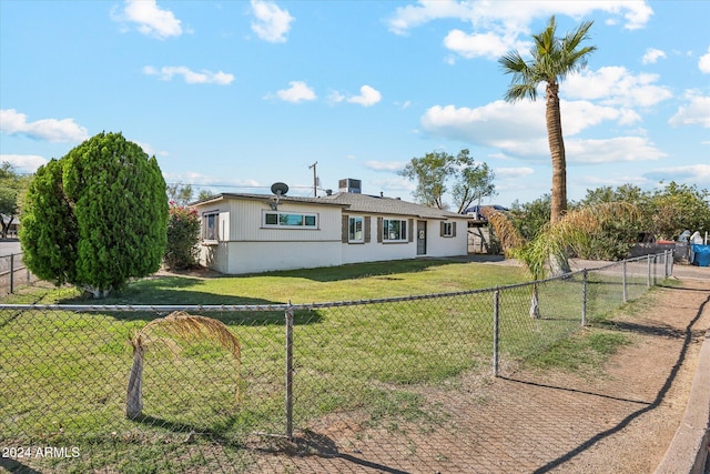 ranch-style home with a front yard