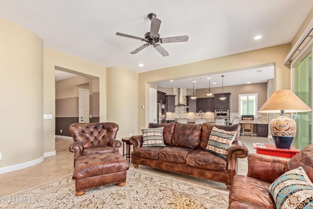 living room with ceiling fan