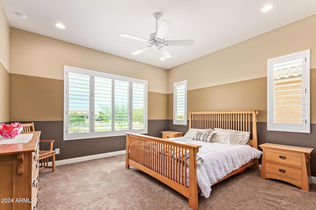 carpeted bedroom featuring ceiling fan