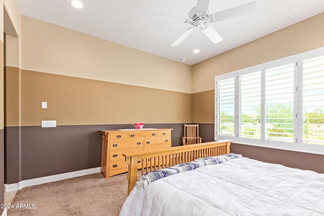 bedroom with ceiling fan and carpet floors