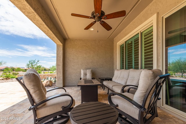 view of patio / terrace featuring an outdoor living space and ceiling fan