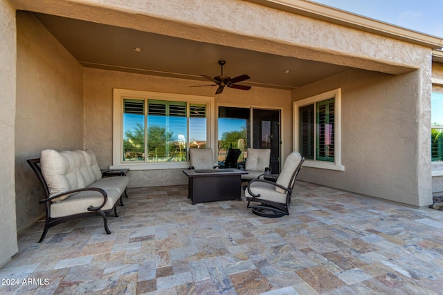 view of patio / terrace featuring ceiling fan