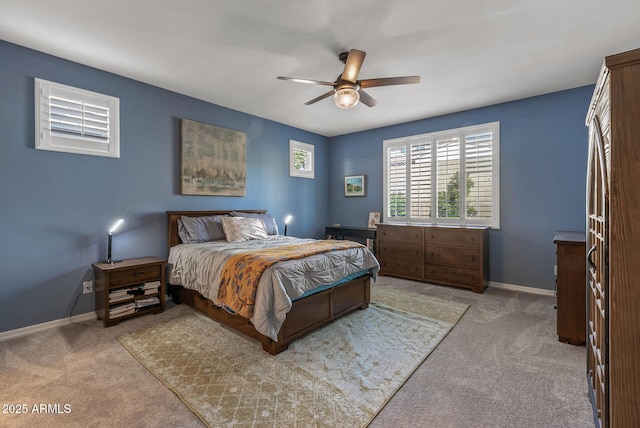 bedroom featuring carpet floors, ceiling fan, and baseboards