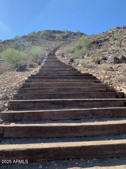 stairway featuring a mountain view