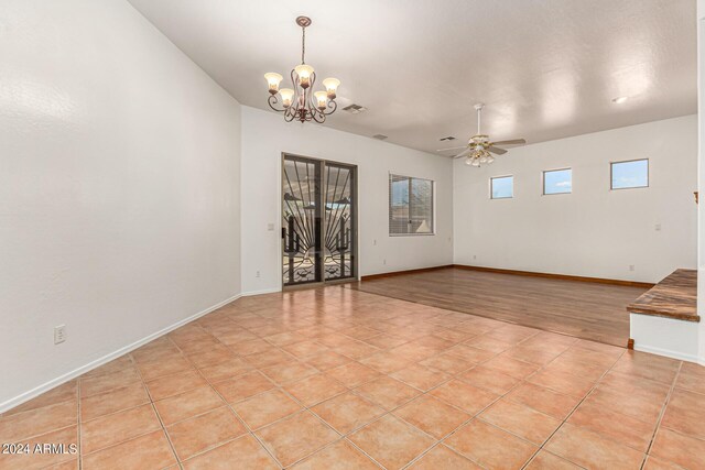 unfurnished living room featuring light tile patterned floors