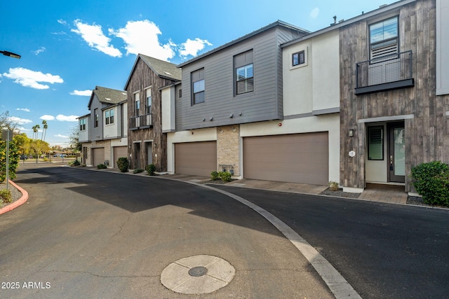 exterior space featuring a residential view and curbs