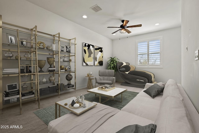 living area featuring recessed lighting, visible vents, carpet, and a ceiling fan