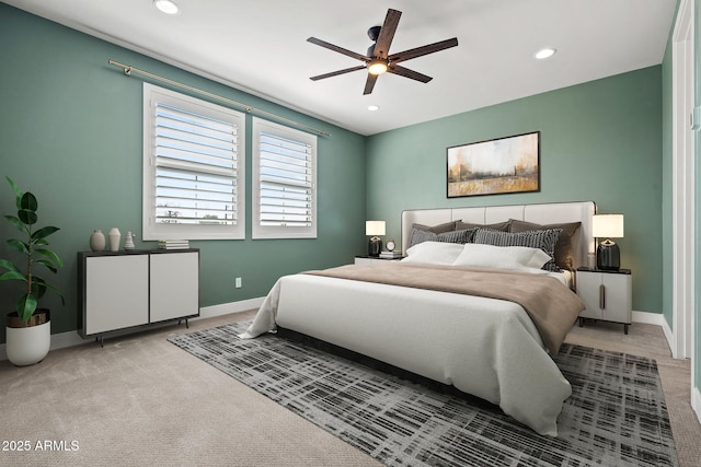 carpeted bedroom with recessed lighting, baseboards, and ceiling fan