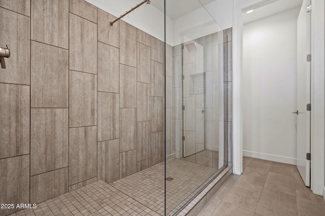 full bath with tile patterned flooring and a stall shower