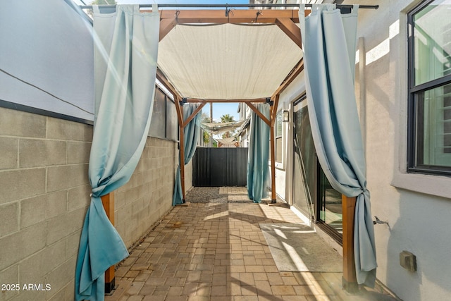 view of patio with fence