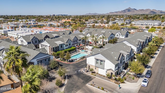 drone / aerial view with a residential view and a mountain view