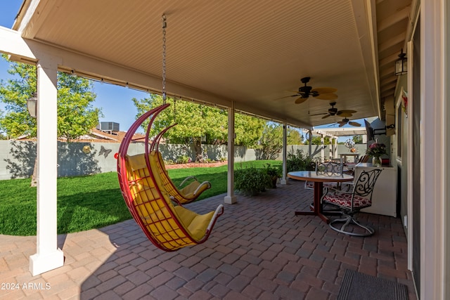 view of patio / terrace featuring ceiling fan