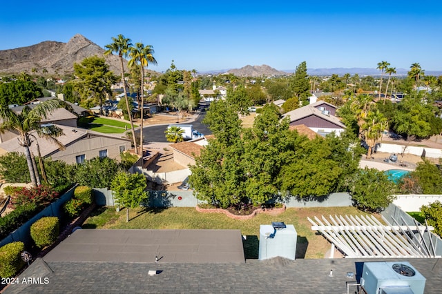 drone / aerial view featuring a mountain view