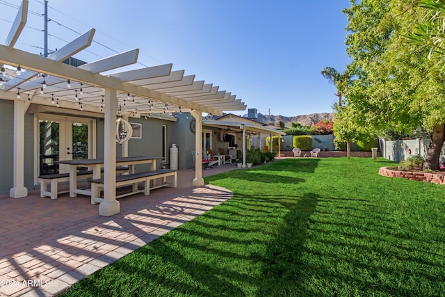 view of yard with a patio area and a pergola