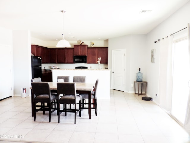 30111 N Oak Dr, Florence, AZ 85132 - dining room featuring baseboards, visible vents, and light tile patterned floors