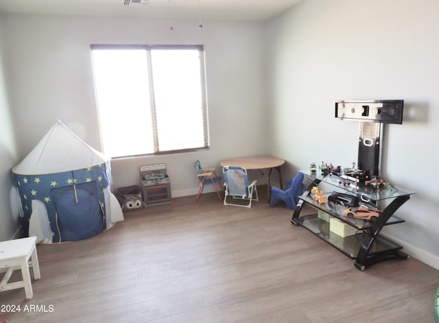 30111 N Oak Dr, Florence, AZ 85132 - game room featuring baseboards, visible vents, and wood finished floors