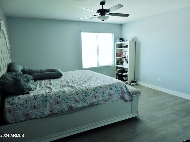30111 N Oak Dr, Florence, AZ 85132 - bedroom featuring baseboards, ceiling fan, and wood finished floors