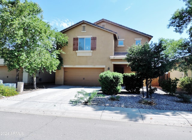 view of property featuring a garage