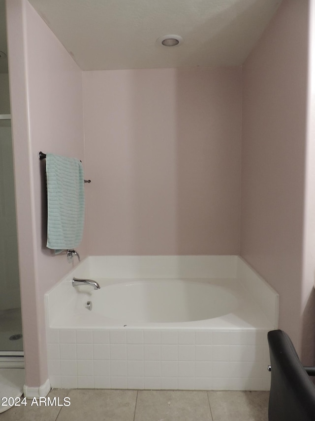 30111 N Oak Dr, Florence, AZ 85132 - bathroom featuring tile patterned floors, a stall shower, and a bath
