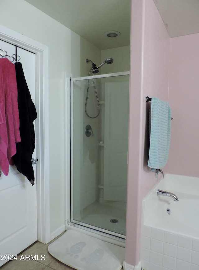 30111 N Oak Dr, Florence, AZ 85132 - bathroom with a bath, tile patterned floors, and a shower stall