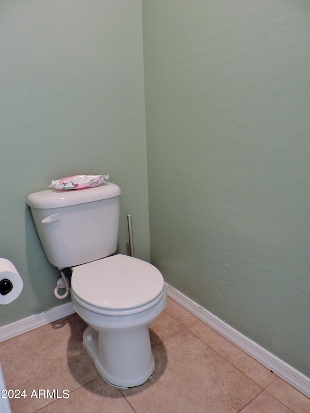 30111 N Oak Dr, Florence, AZ 85132 - bathroom featuring baseboards, toilet, and tile patterned flooring