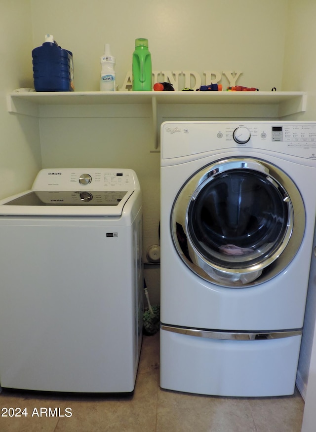 30111 N Oak Dr, Florence, AZ 85132 - laundry area featuring light tile patterned flooring, washer and clothes dryer, and laundry area