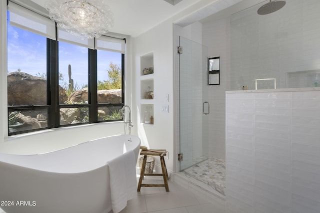 bathroom with shower with separate bathtub