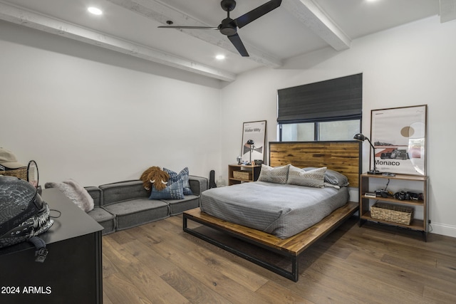 bedroom with beam ceiling, ceiling fan, and dark wood-type flooring