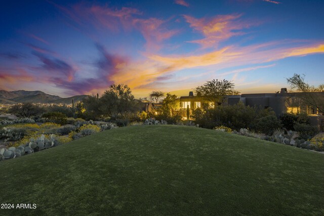 yard at dusk with a mountain view