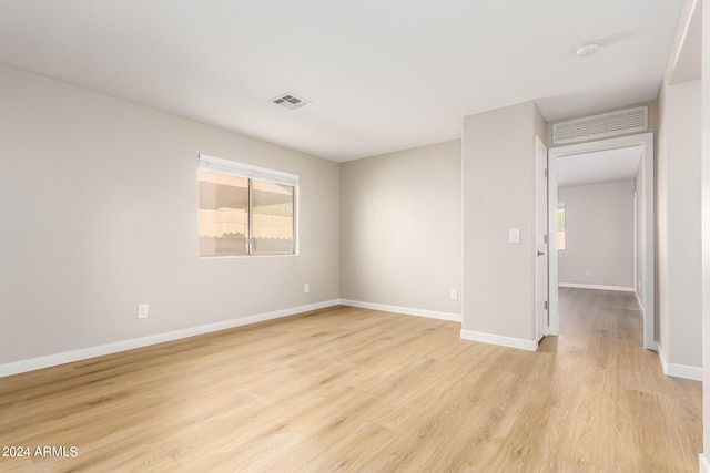 empty room featuring light hardwood / wood-style floors