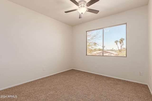 empty room with carpet floors and ceiling fan