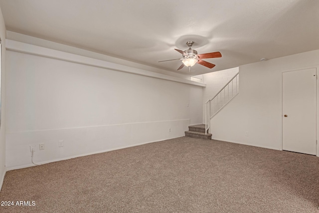 interior space featuring carpet floors and ceiling fan