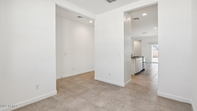 view of tiled spare room