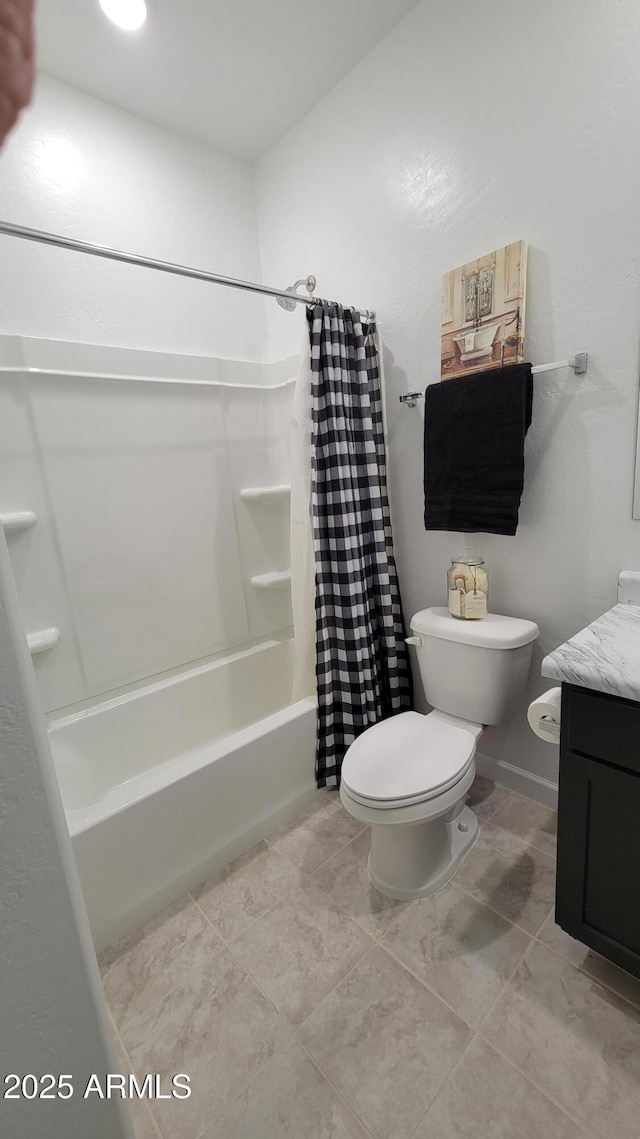 full bathroom featuring shower / tub combo, vanity, and toilet