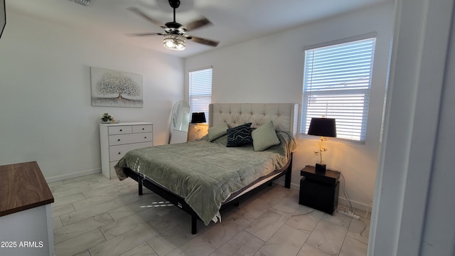 bedroom featuring ceiling fan